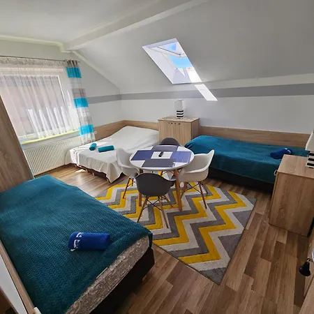 Δωμάτια σε οικογενειακή κατοικία Goscinne U Joli